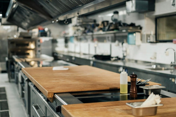 What cleaning products should be used in professional kitchens?
